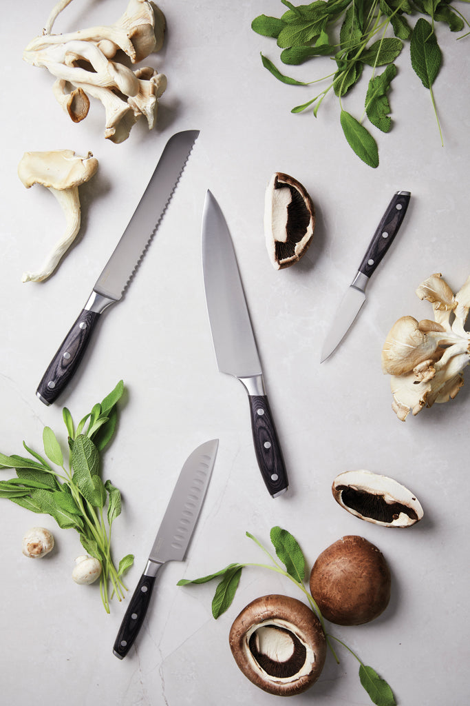 Load image into Gallery viewer, Vinga Kaiser bread knife with serrated edge and wooden handle, ideal for slicing bread and baked goods in a home kitchen setting.