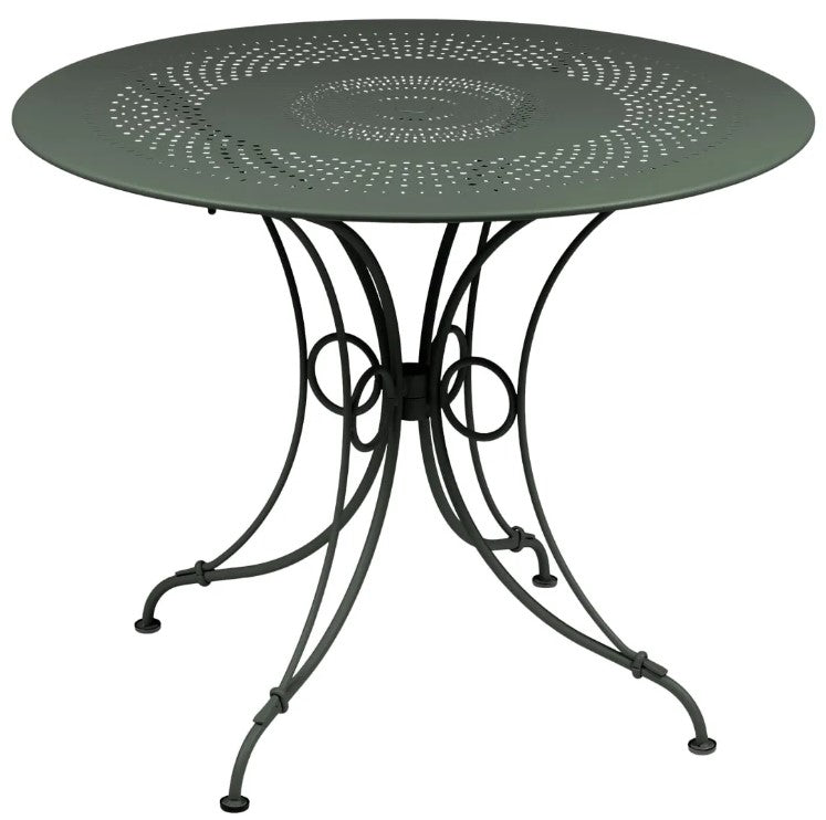 Load image into Gallery viewer, Fermob 1900 outdoor table with a 96cm diameter, shown in a vibrant color, ideal for patio or garden outdoor dining.