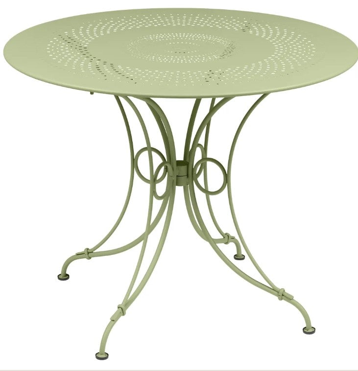 Load image into Gallery viewer, Fermob 1900 outdoor table with 96cm diameter, round metal table in vibrant color, suitable for patio or garden settings.
