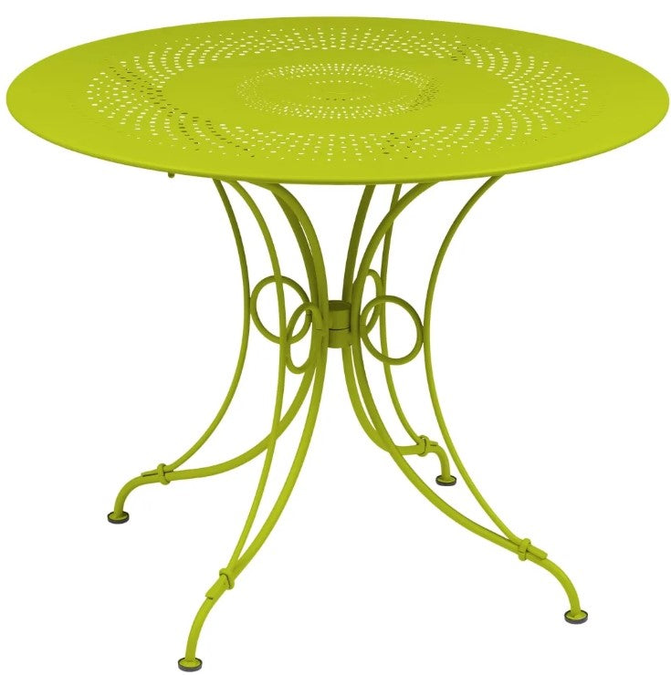 Load image into Gallery viewer, Fermob 1900 outdoor table with 96cm diameter in vibrant color, suitable for patio or garden seating.