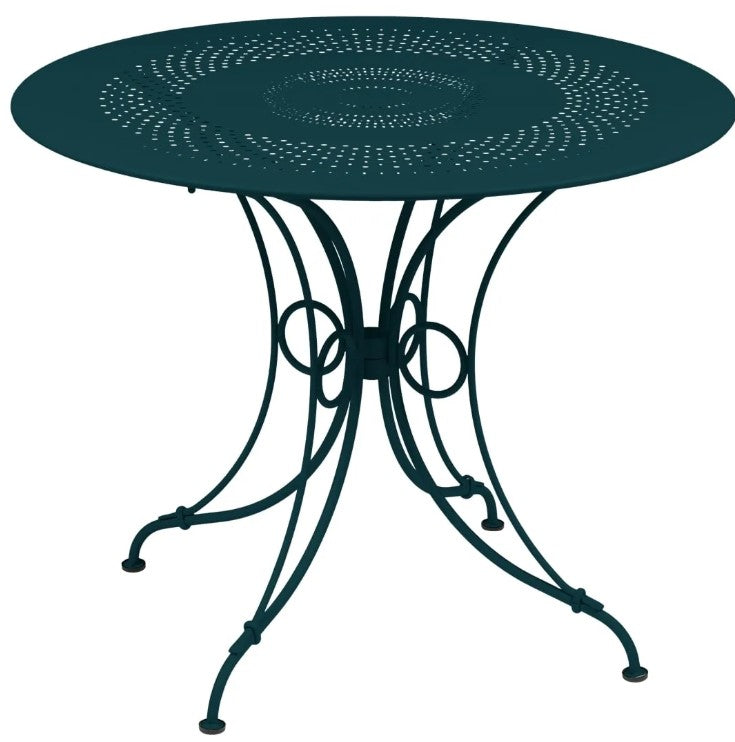 Load image into Gallery viewer, Fermob 1900 outdoor table with 96cm diameter, featuring a round metal design in vibrant color, suitable for patio or garden use.