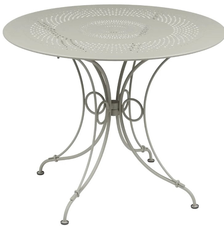 Load image into Gallery viewer, Fermob 1900 outdoor table with a 96cm diameter, featuring a sleek round design in vibrant outdoor furniture style.