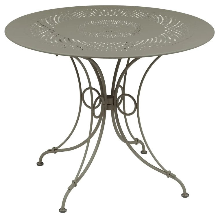 Load image into Gallery viewer, Fermob 1900 outdoor table with a 96cm diameter, featuring a sleek metal design perfect for patio or garden use.