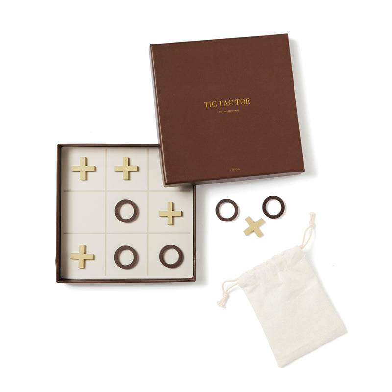 Load image into Gallery viewer, Vinga Criss-cross coffee table game in a modern living room setting, featuring a stylish wooden table with game elements on top.