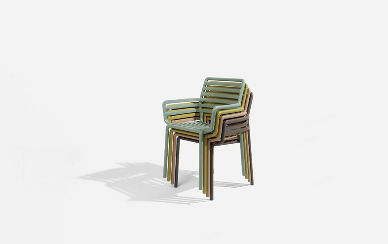Load image into Gallery viewer, Green Nardi Doga outdoor armchair with curved design and slatted seat, ideal for relaxing outdoor spaces.