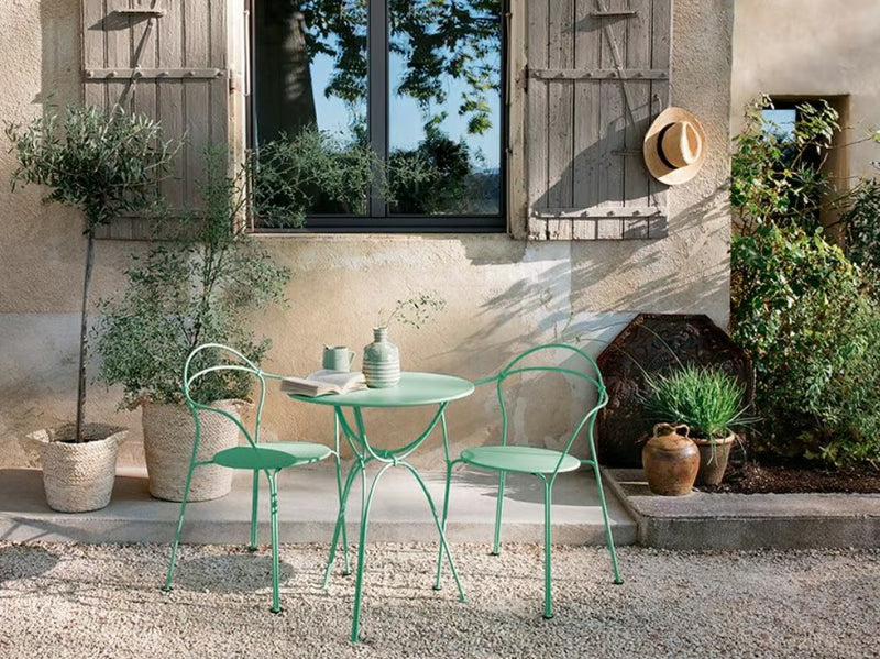 Load image into Gallery viewer, Fermob Airloop Table with 60cm diameter, stylish garden table with a circular top, ideal for outdoor cafes or hotel patios.