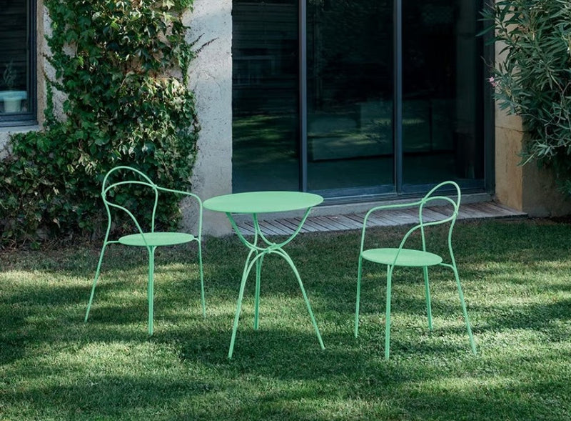 Load image into Gallery viewer, Fermob Airloop garden table with 60cm diameter, modern outdoor design, shown with a smooth round surface and sleek legs.