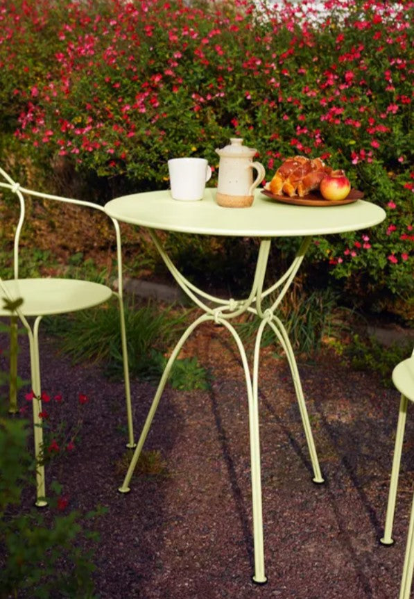 Load image into Gallery viewer, Fermob Airloop Garden Table with 60cm diameter, modern round outdoor table for cafes, restaurants, and hotel patios.