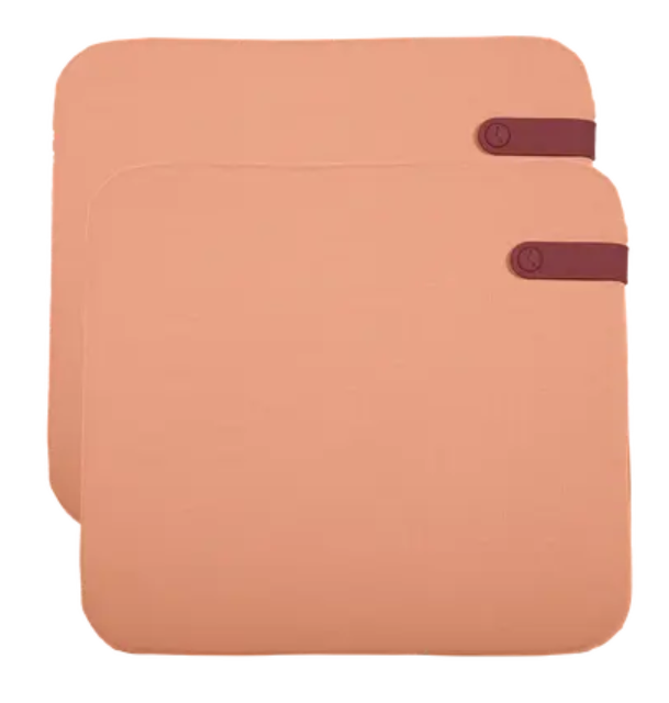 Load image into Gallery viewer, Set of 2 Fermob outdoor cushions in apricot color, 41 x 45 cm, featuring vibrant fabric for patio seating.