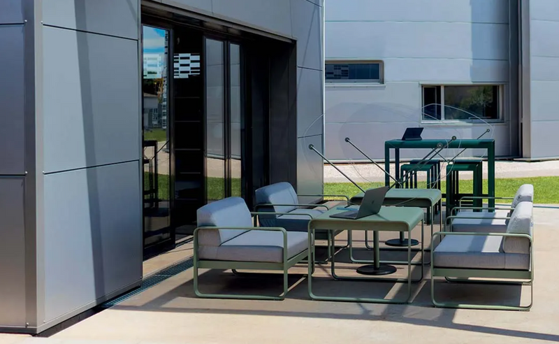 Load image into Gallery viewer, Fermob Bellevie armchair with woven rattan-style seat and backrest, metal frame in a modern outdoor furniture design