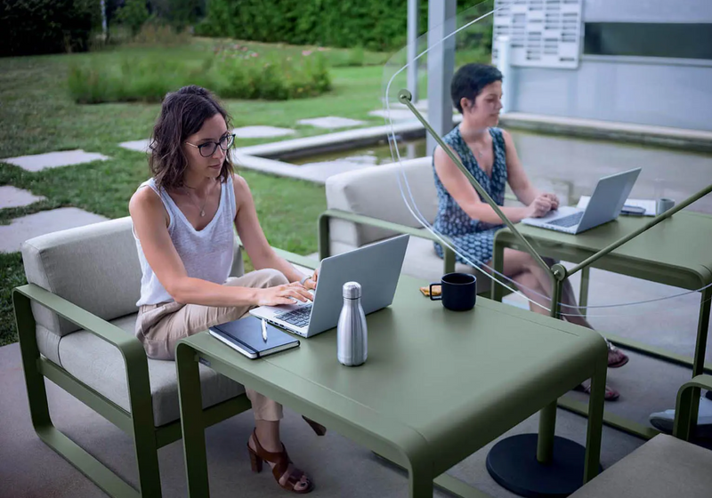 Load image into Gallery viewer, Fermob Bellevie armchair with a sleek metal frame and cushioned seat, modern outdoor furniture for stylish relaxation.