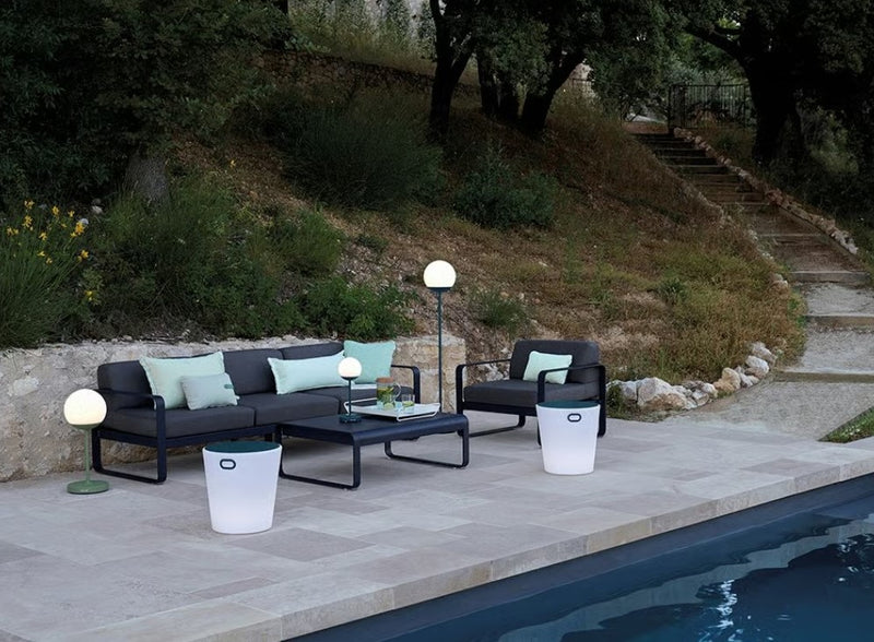 Load image into Gallery viewer, Fermob Bellevie low aluminum lounge table with 103x75 cm surface, ideal for outdoor garden or patio seating arrangements.
