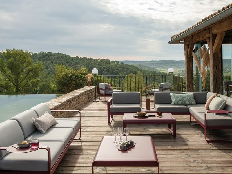 Load image into Gallery viewer, Fermob Bellevie low aluminum lounge table measuring 103x75 cm, designed for outdoor garden and restaurant settings.