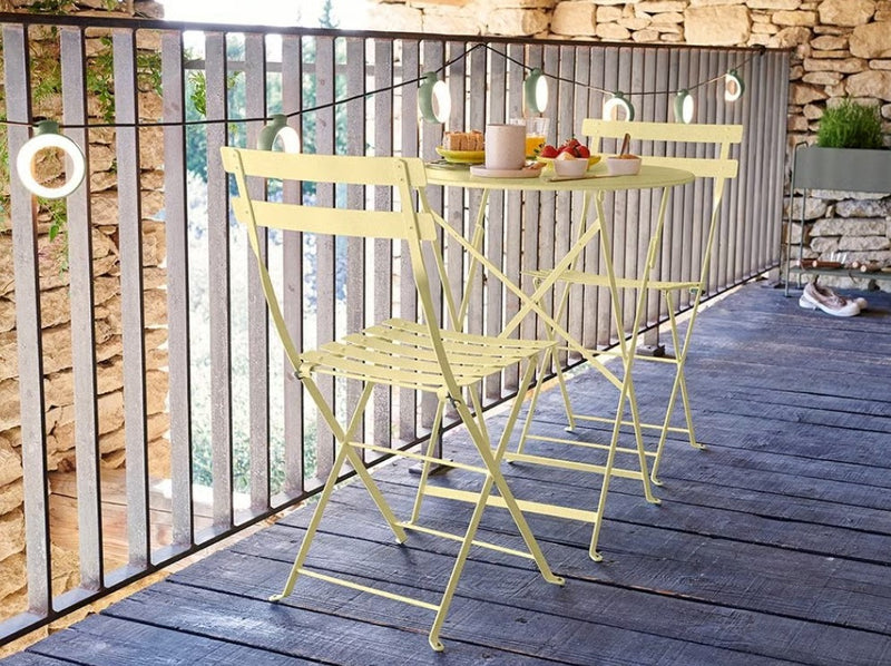 Load image into Gallery viewer, Fermob Bistro Metal Folding Chair for outdoor dining, featuring a sleek metal design with armrests and a modern finish.