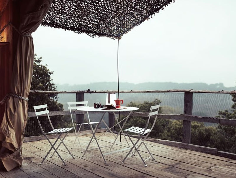 Load image into Gallery viewer, Fermob Bistro Metal Folding Chair for outdoor dining, with a sleek metal design and comfortable seating for restaurant or patio use.