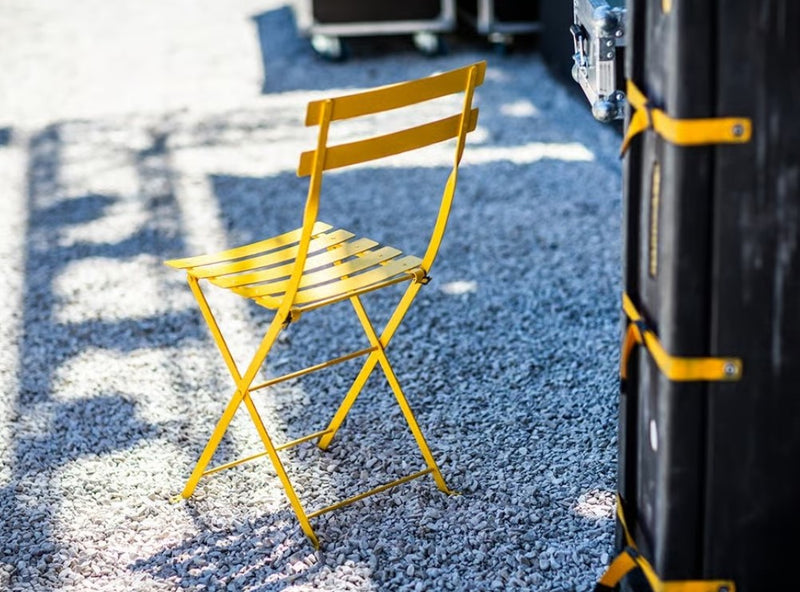 Load image into Gallery viewer, Fermob Bistro Metal Folding Chair for outdoor dining, with a sleek metal design and armrests, ideal for restaurant and hospitality use.