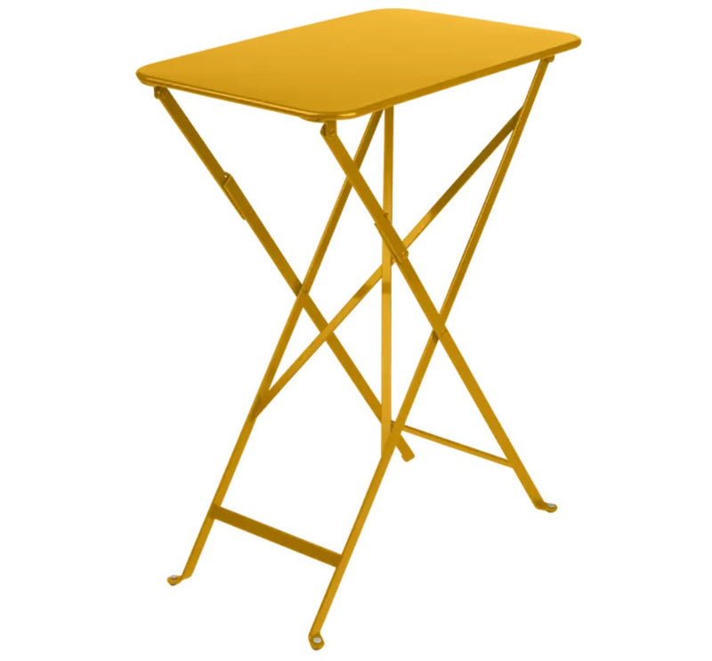 Load image into Gallery viewer, Fermob Bistro folding table, 57x37 cm, rectangular metal table for outdoor balcony or hospitality use, shown in a modern setting.