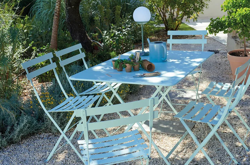 Load image into Gallery viewer, Fermob foldable bistro table measuring 117x77 cm, ideal for outdoor restaurant, hotel, or garden hospitality settings.