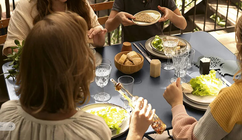 Load image into Gallery viewer, Fermob foldable bistro table, 117 x 77 cm, outdoor hospitality furniture with a sleek design for restaurants and gardens.