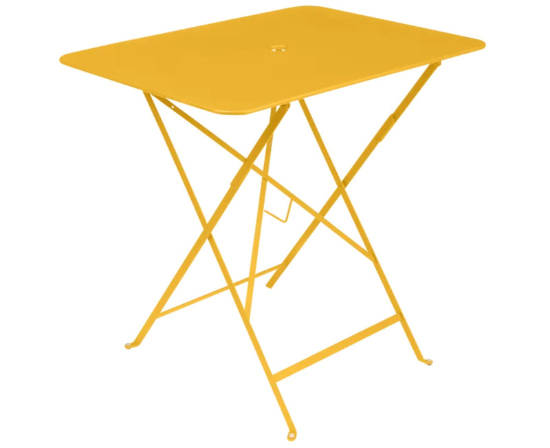 Load image into Gallery viewer, Fermob foldable bistro table measuring 77x57 cm, with a sleek surface, ideal for restaurant and hotel outdoor dining spaces.