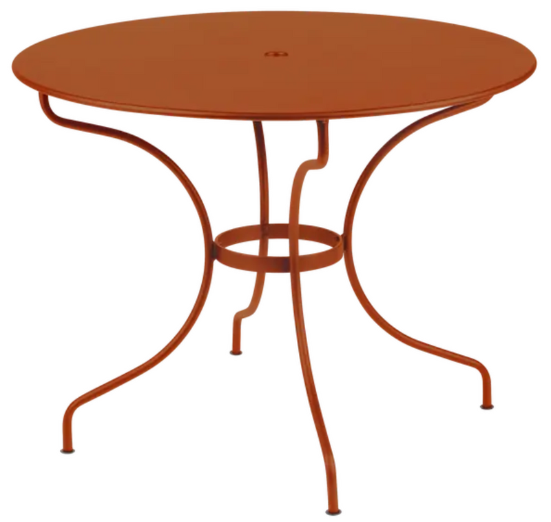Load image into Gallery viewer, Orange Fermob OPÉRA+ outdoor metal table with a 96 cm diameter, designed for five-seater patio dining.