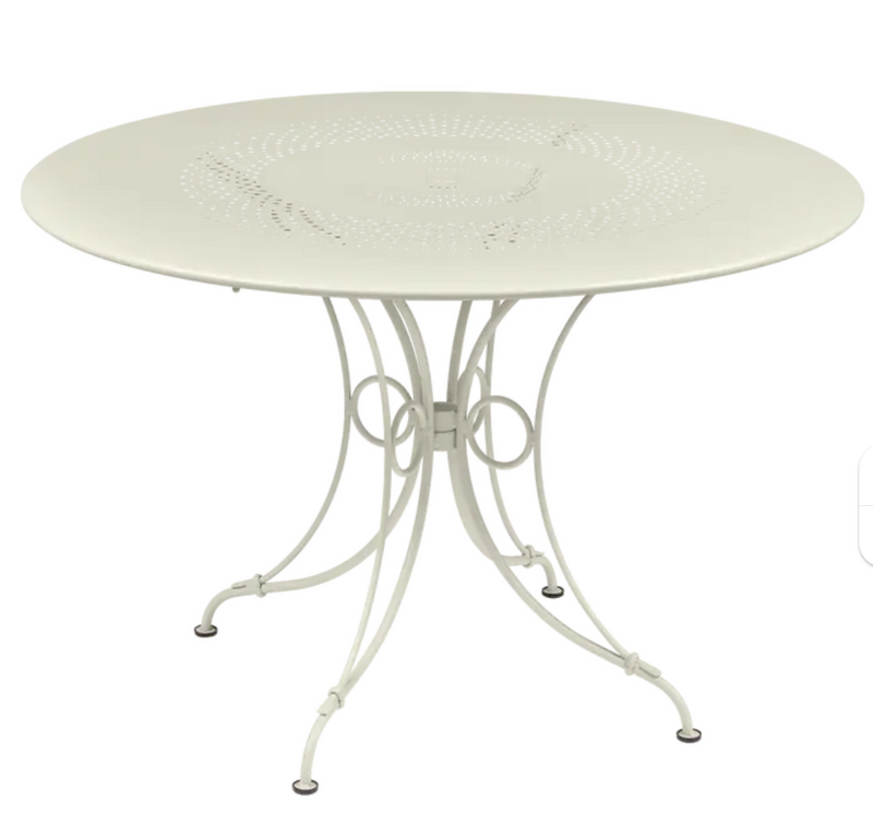 Load image into Gallery viewer, Clay grey Fermob 1900 outdoor round table with 117cm diameter, ideal for outdoor dining and garden settings.