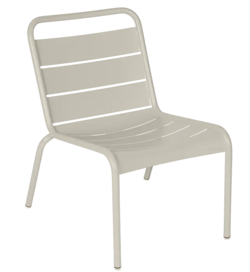 Load image into Gallery viewer, Clay grey Fermob Luxembourg lounge chair with metal frame, outdoor furniture suitable for patio or restaurant settings.