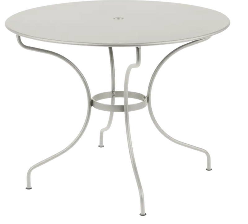 Load image into Gallery viewer, Fermob OPÉRA+ outdoor metal table with a 96 cm diameter in Cley Grey, suitable for five people on patio or garden.
