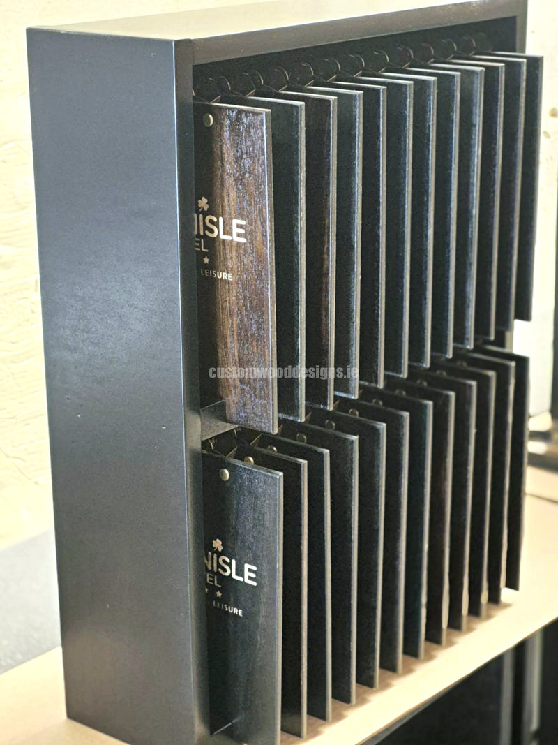 Load image into Gallery viewer, Set of 24 branded A5 wooden clipboards with display unit by Custom Wood Designs, ideal for hospitality and hotel menu organization.