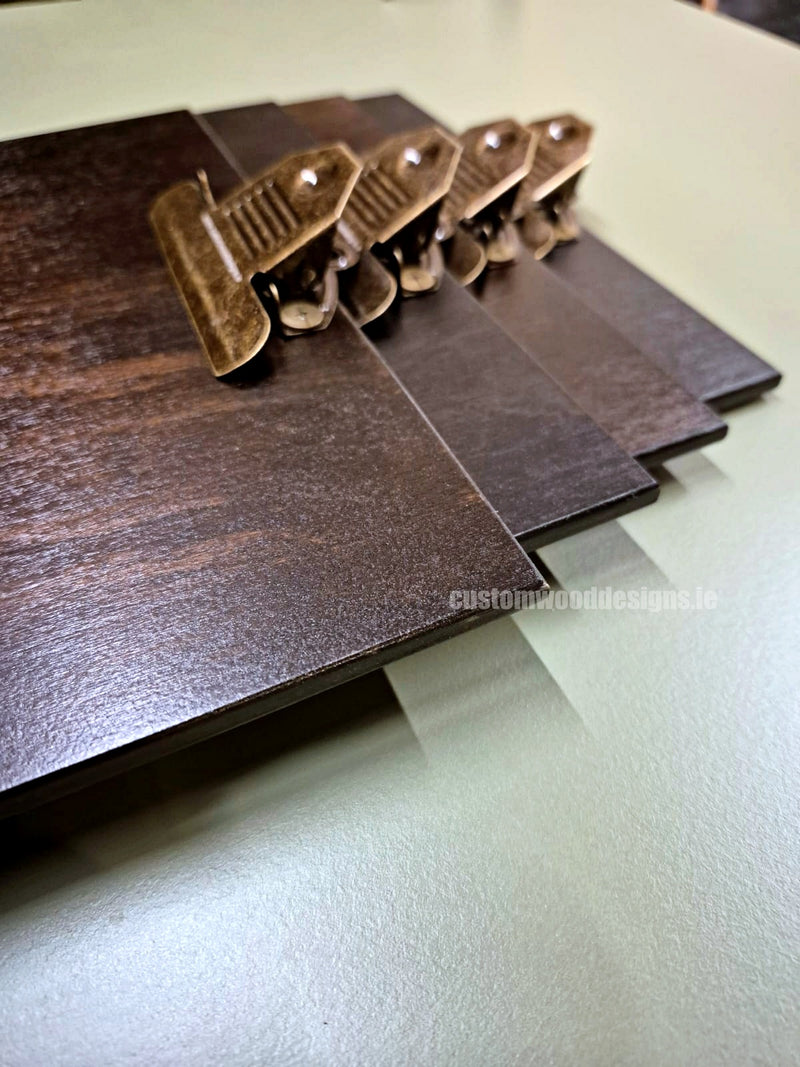Load image into Gallery viewer, Set of 24 branded A4 wooden clipboards by Custom Wood Designs, displayed for hospitality, cafe, bar, and hotel menu use.