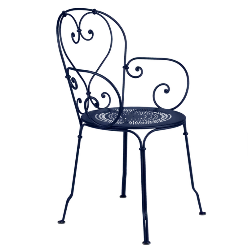Load image into Gallery viewer, Deep blue Fermob 1900 lounge armchair with rounded armrests and modern design, suitable for outdoor patio seating.