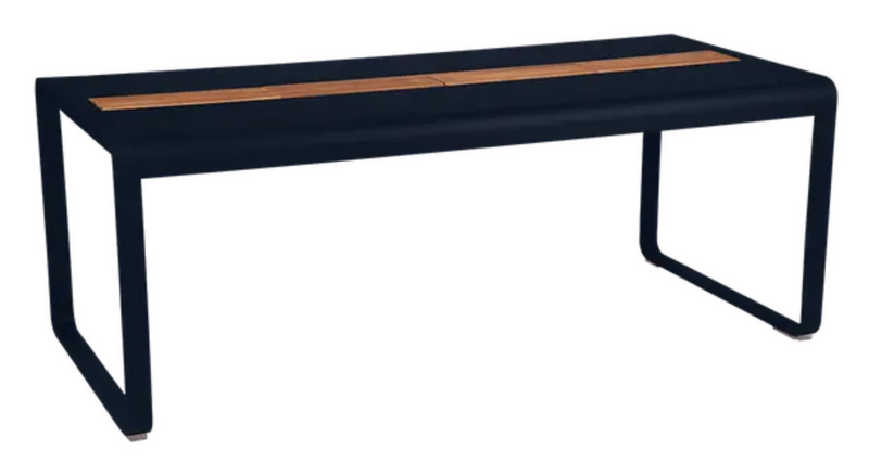 Load image into Gallery viewer, Deep blue Fermob Bellevie outdoor dining table with eight seats, wood and metal construction, featuring built-in storage.