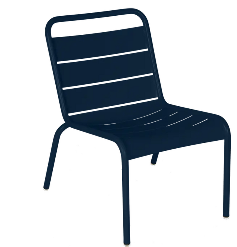 Load image into Gallery viewer, Deep blue Fermob Luxembourg lounge chair with metal frame, suitable for outdoor and restaurant seating.