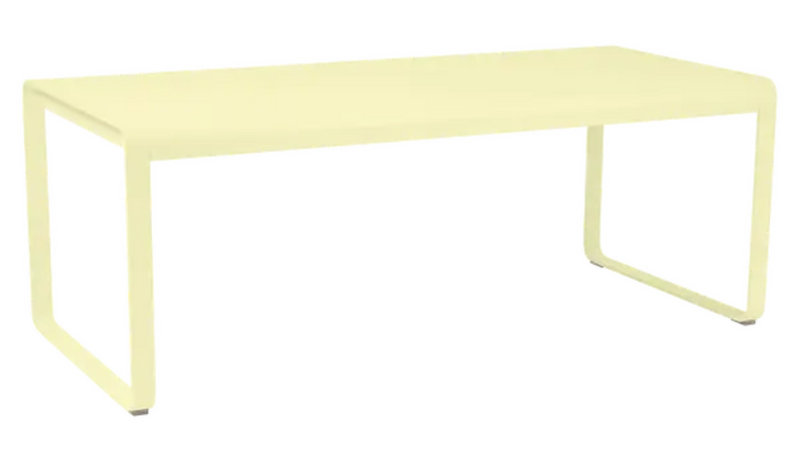 Load image into Gallery viewer, Fermob Bellevie outdoor metal dining table, 196x90 cm, eight-seater with frosted lemon finish, suitable for outdoor dining spaces.