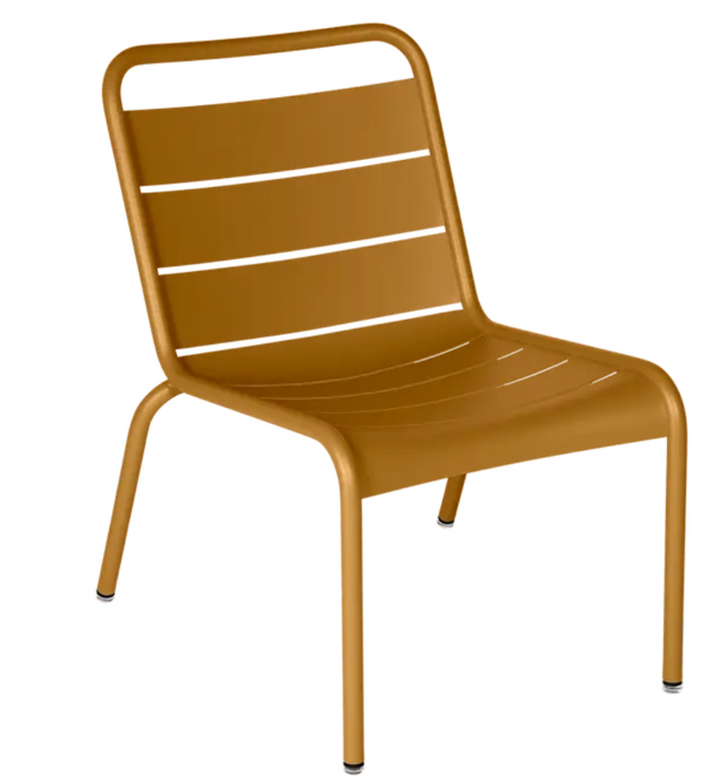 Load image into Gallery viewer, Fermob Luxembourg Lounge Chair with a metal frame and cushioned seat, designed for outdoor use and stylish relaxation.
