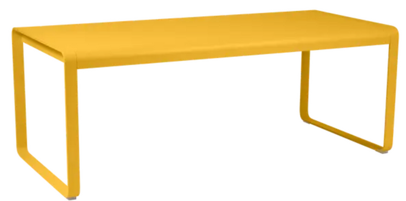 Load image into Gallery viewer, Fermob Honey Bellevie outdoor metal dining table, 196 x 90 cm, eight-seater with a sleek, modern design for outdoor dining spaces.