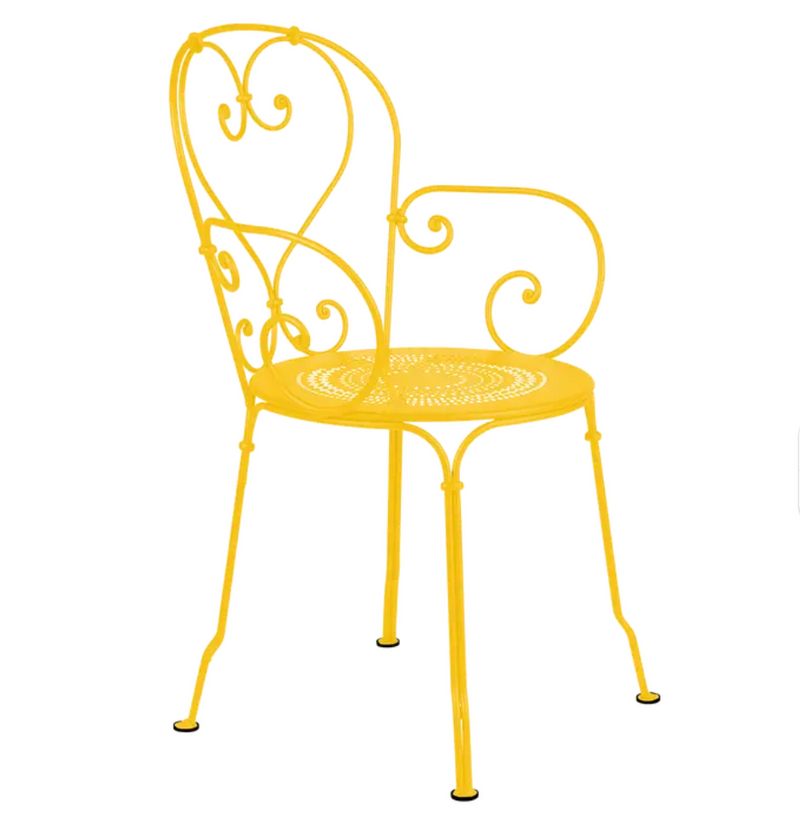 Load image into Gallery viewer, Honey-colored Fermob 1900 Lounge Armchair with a sleek, modern design for outdoor patio relaxation.