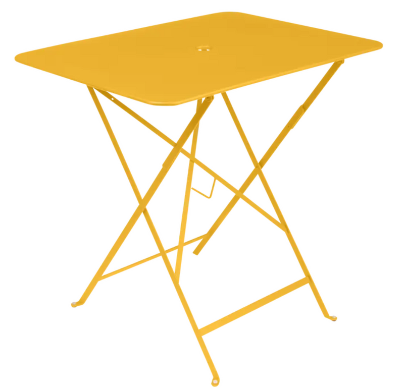 Load image into Gallery viewer, Fermob honey foldable bistro table measuring 77x57 cm, outdoor metal furniture with a sleek, foldable design.