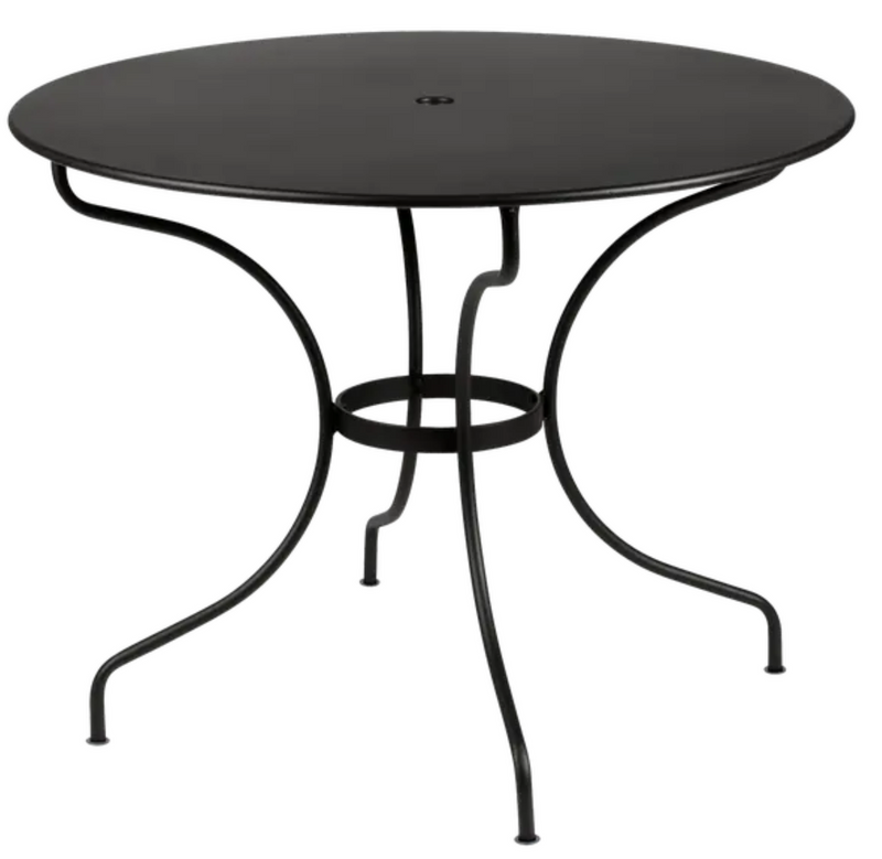 Load image into Gallery viewer, Fermob OPÉRA+ outdoor metal table with 96cm diameter in Liquorice color, designed for five-seater patio dining.