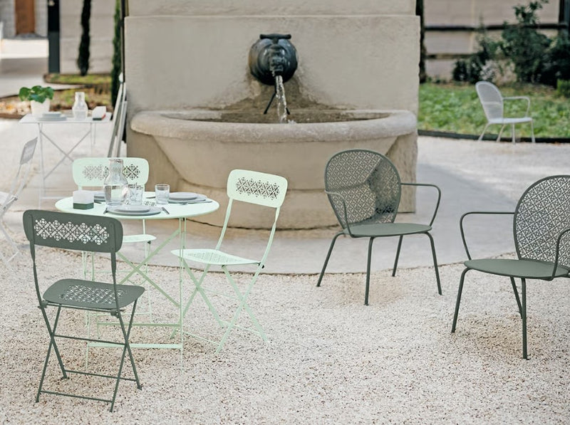 Load image into Gallery viewer, Fermob Lorette outdoor metal chair with a sleek design, suitable for restaurant or patio outdoor living spaces.