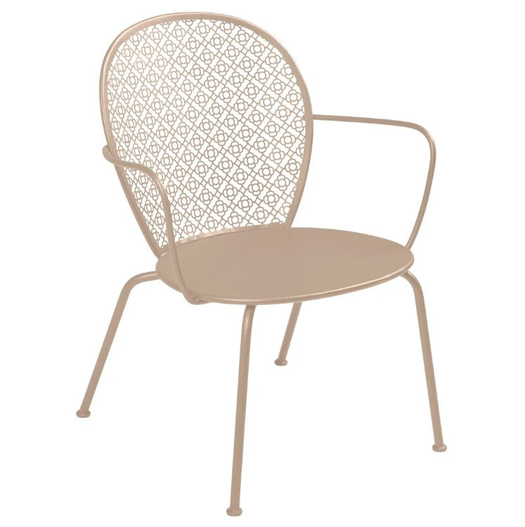 Load image into Gallery viewer, Fermob Lorette low armchair with metal frame, featuring a stylish curved design for outdoor or hotel lounge seating.