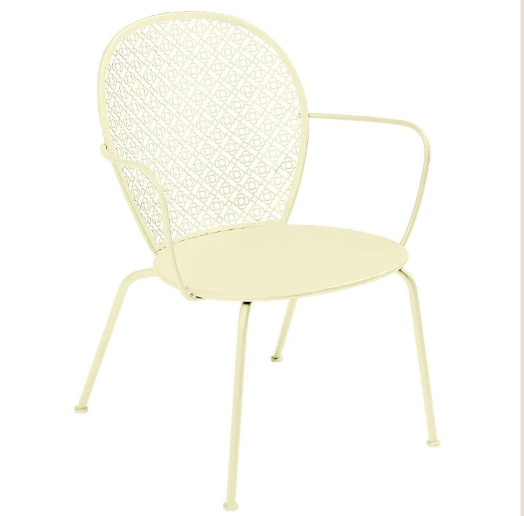 Load image into Gallery viewer, Fermob Lorette low armchair with metal frame and curved design, suitable for outdoor and hospitality settings.