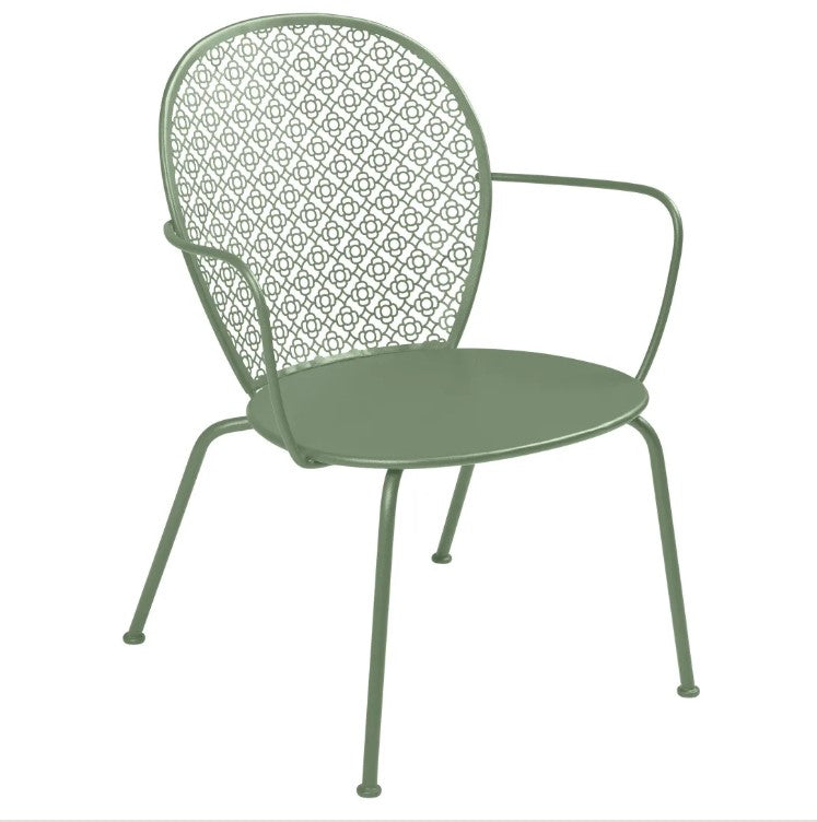 Load image into Gallery viewer, Fermob LORETTE low armchair with a metal frame, featuring a modern design suitable for outdoor and hospitality settings.