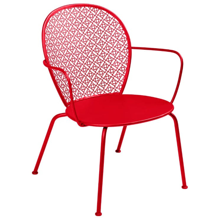 Load image into Gallery viewer, Fermob Lorette low armchair with metal frame and curved design, suitable for outdoor living and hospitality settings.