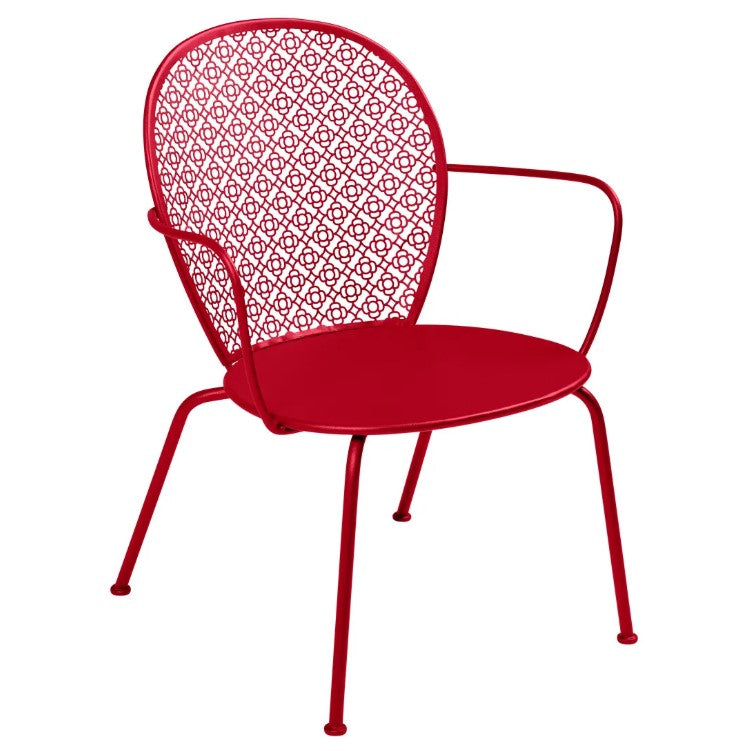 Load image into Gallery viewer, Fermob Lorette low armchair with metal frame, stylish outdoor seating for hospitality and outdoor living settings.
