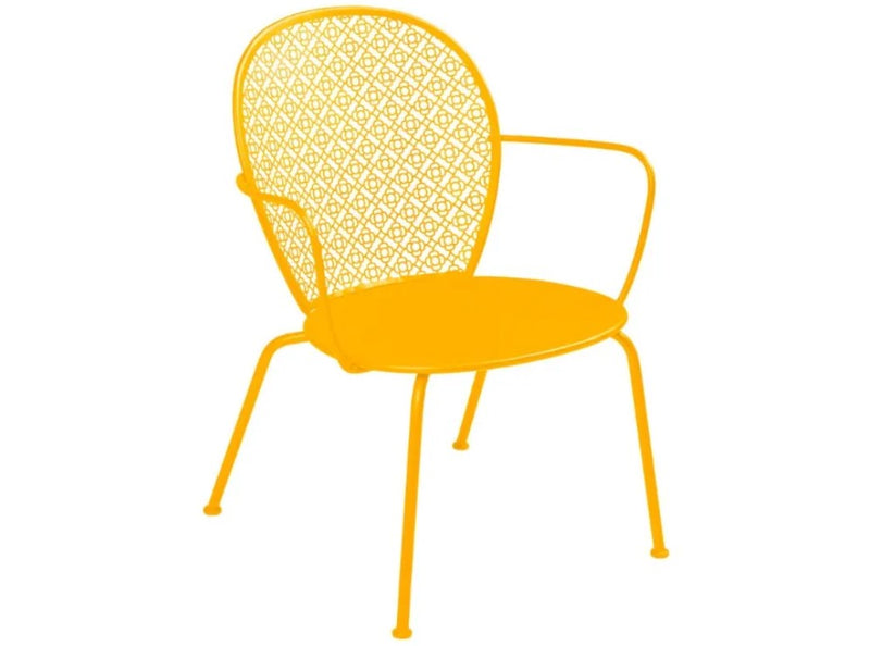 Load image into Gallery viewer, Fermob Lorette low armchair with metal frame and curved design, ideal for outdoor living or hospitality settings.