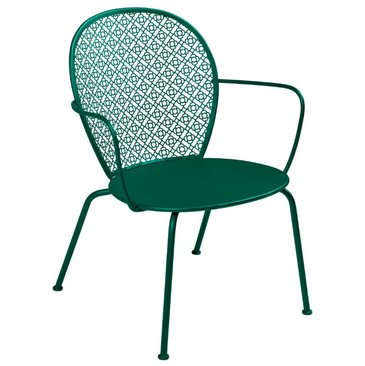 Load image into Gallery viewer, Fermob Lorette low armchair with metal frame and curved design, ideal for outdoor seating and hotel or hospitality settings.