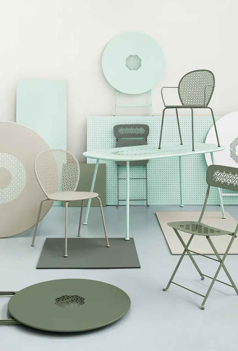 Load image into Gallery viewer, Fermob Lorette round garden table with 110 cm diameter, metal construction, fire-resistant and stylish outdoor furniture.
