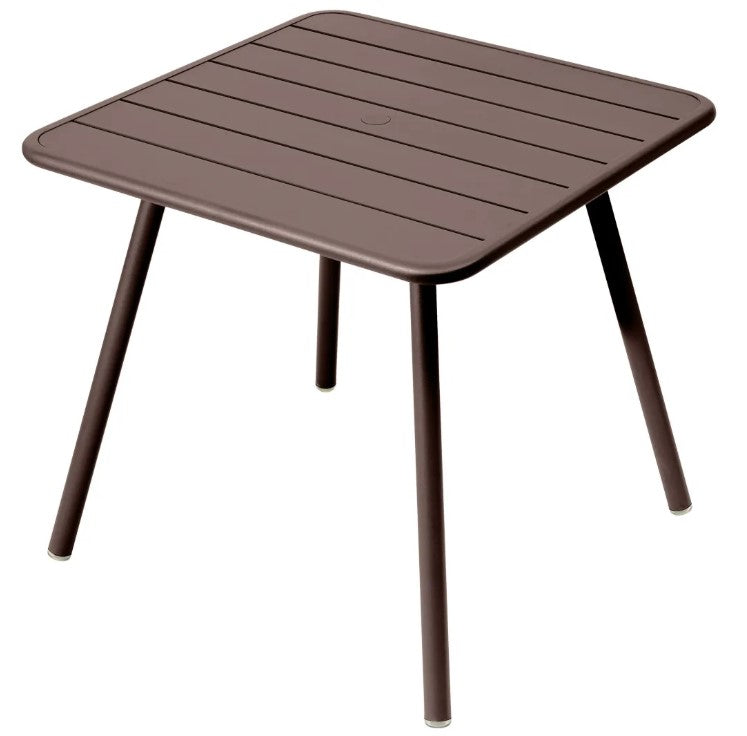 Load image into Gallery viewer, Fermob Luxembourg 4-leg garden table, 80x80 cm, metal with brown aluminum finish, suitable for outdoor dining and patio use.