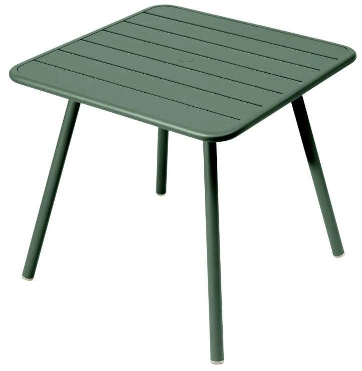 Load image into Gallery viewer, Green Fermob Luxembourg 4-leg garden table, 80x80 cm, made of metal, perfect for outdoor patio or garden spaces.